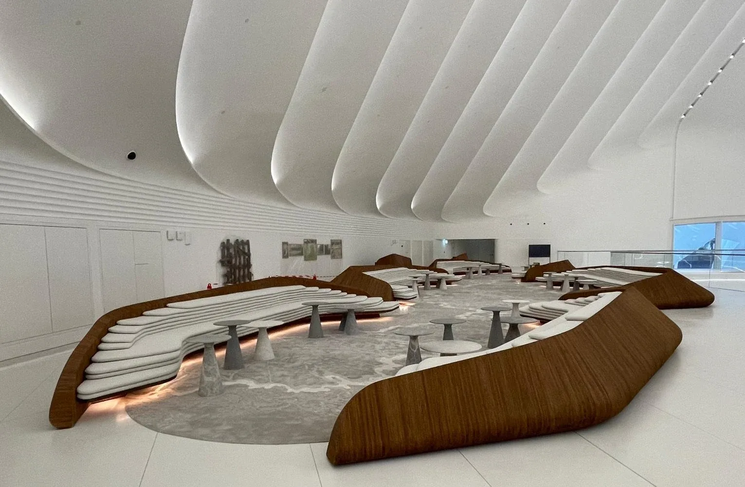 Sculpted lounge with curved timber seating